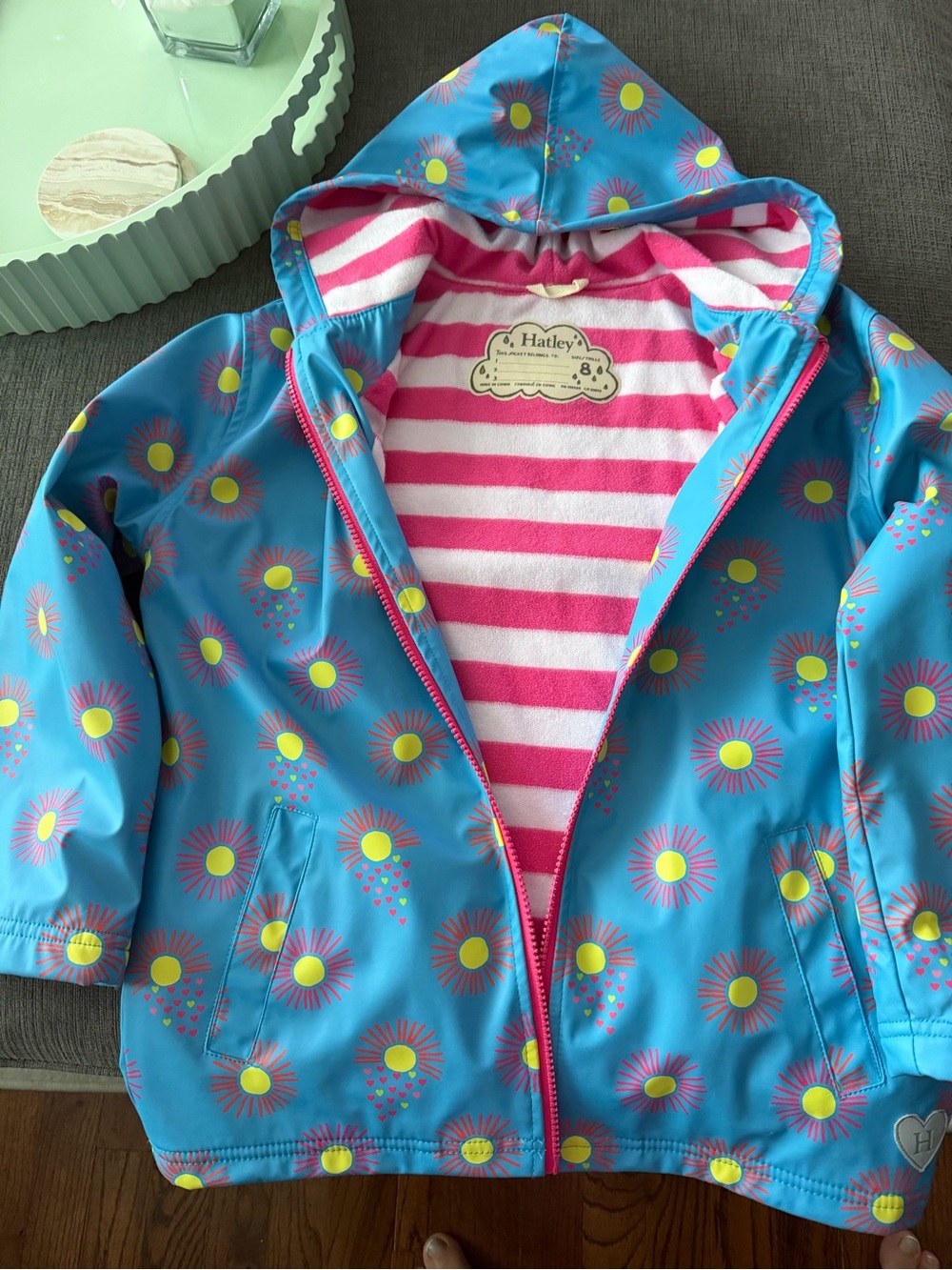Hatley Bright Blue Daisy Hooded Raincoat with Pink Lining